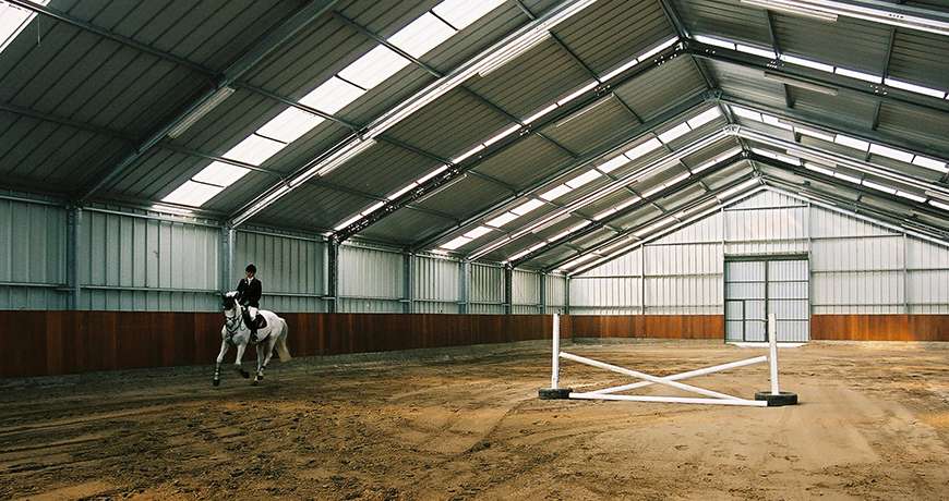 Horse Arena interior obstacle course light steel building